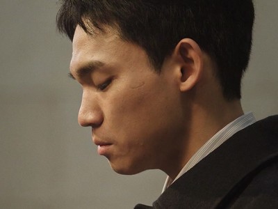 Cheol Jun gives a speech at the church.