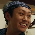 The waiter is portrayed by Japanese actor Satoshi Otsuki.