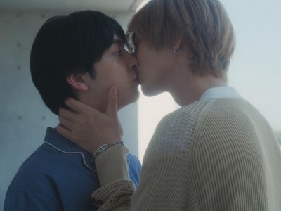 Shirasaki and Asami share a kiss.