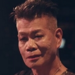 Priscilla is played by the actor Yoshiaki Umegaki (梅垣義明).