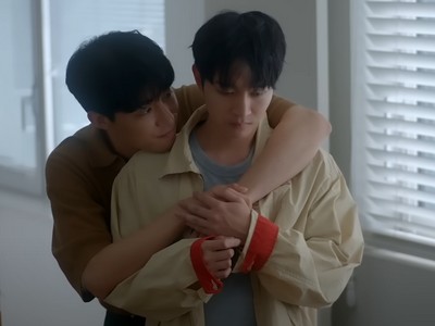 Taeha hugs Jiwoon in the bedroom.