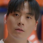 The coach is portrayed by a Korean actor.