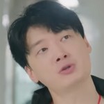 The swim coach is portrayed by a Korean actor.