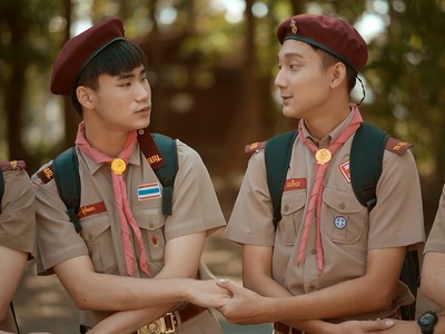 Ram and Wut hold hands during the scout camp.