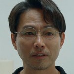 The Department Head is portrayed by a Korean actor.