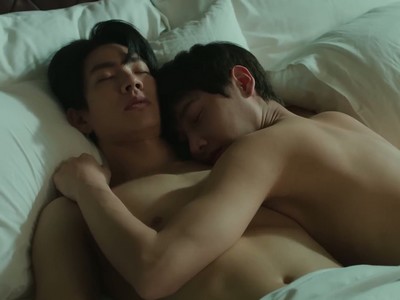 Jira and Koh rest in bed.