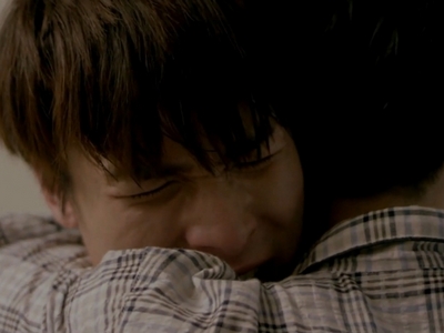 Ait gives Bas a hug after hearing his confession.