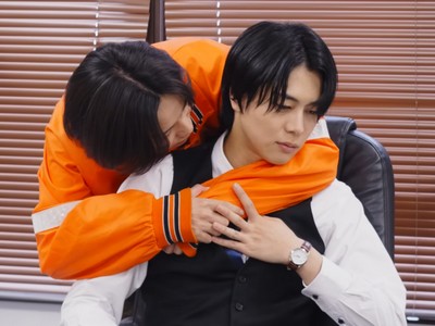 Keita wraps his arms around Joji.