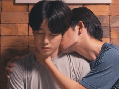 Daonuea doesn't seem excited when Tee kisses his neck.