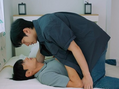 Jio pins Dokyung in bed.
