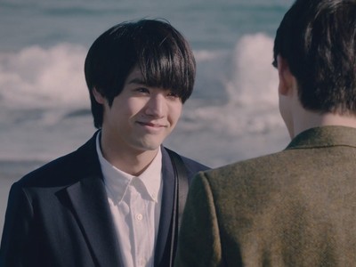 Adachi smiles as he accepts Kurosawa's marriage proposal.