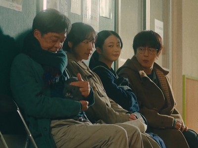 Hotaru attends the teacher-parent conference with her family.