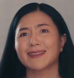 Krom's mother is portrayed by a Thai actress.