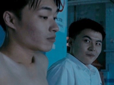 Jian and Kai hang out at the pool.