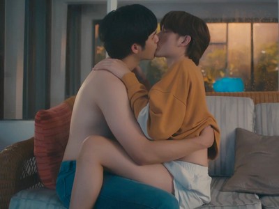 Kevin and Pluem make out on the sofa.