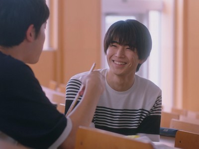 Kohei smiles when Taichi enjoys his lunch.