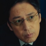 Taguchi is portrayed by the Japanese actor Yoshimi Tokui (徳井義実).