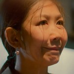 Q's mother is portrayed by a Thai actress.