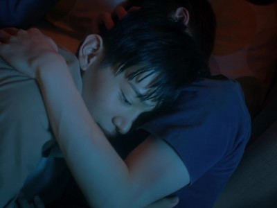 Ryota hugs Kazuhiro in bed.