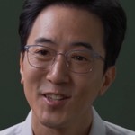 Producer Lee is portrayed by a Korean actor.