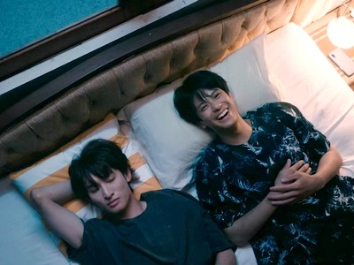 Sota and Kai talk in bed.