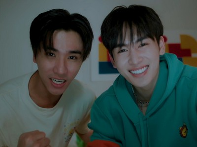 Pobmek and Solar are smiling.