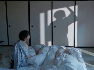 Kuji is in the room with Azuma's shadow.