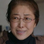 Mikami is portrayed by a Japanese actress.