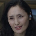 Young's boss is portrayed by a Korean actress.