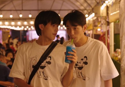 Young and Gyu Ho buy Mickey Mouse shirts on their vacation.