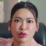 The boss is portrayed by a Thai actress.
