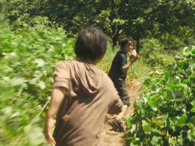 The Monster movie ends with Minato and Yori running through a grassy field.