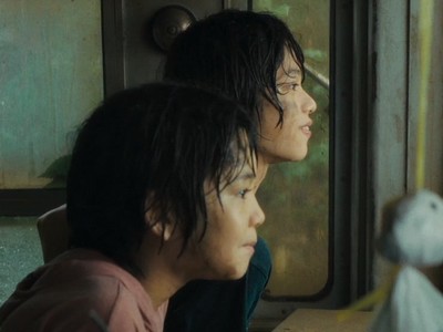 Minato and Yori stare out the window.