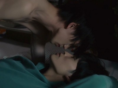 Yoh and Segasaki have an intimate moment in bed.