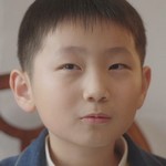 Woojoo is portrayed by a Korean child actor.
