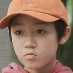 Young Wataru is portrayed by a Japanese child actor.