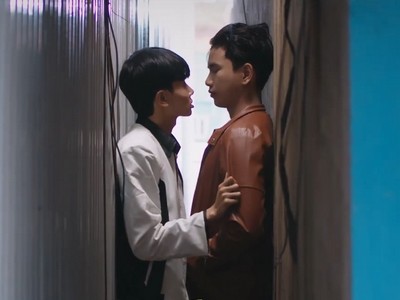 An and Thanh get intimate with each other in between the walls.