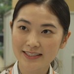 The clerk is portrayed by Japanese actress Ayako Shiina (椎名綾子).