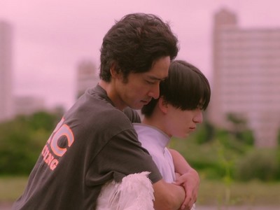 Kouki gives Takeshi a hug.