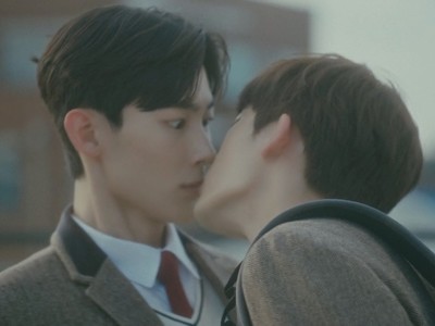 Wan and Ki Tae kiss on the school rooftop in Our Dating Sim Episode 1.