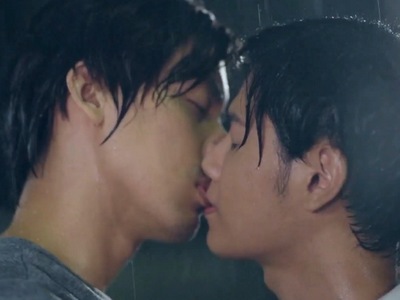 Maze and Phap kiss in the rain.
