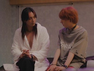 Chiaki and Enaga are in bed.