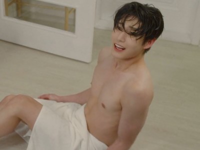A shirtless Ho Joon is on the floor, wearing just a towel.