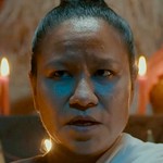 The Shaman is portrayed by a Thai actress.