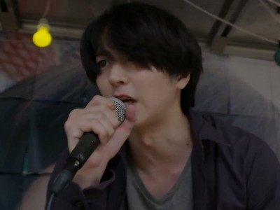 Jin performs his rap performance.