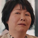 Youko's coworker is portrayed by Japanese actress Nobue Iketani (池谷のぶえ).