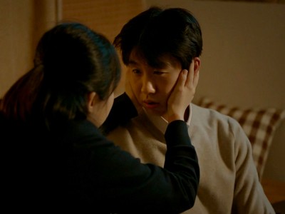 Dong Joon talks to his niece.