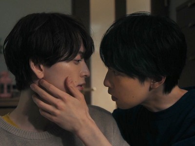 Kanade is touched by Mashiro during an intimate moment.