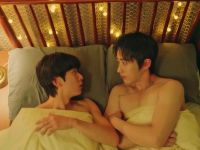Minu and Lucifer are in bed together.