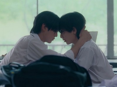 Mayama and Asamiya's foreheads touch.